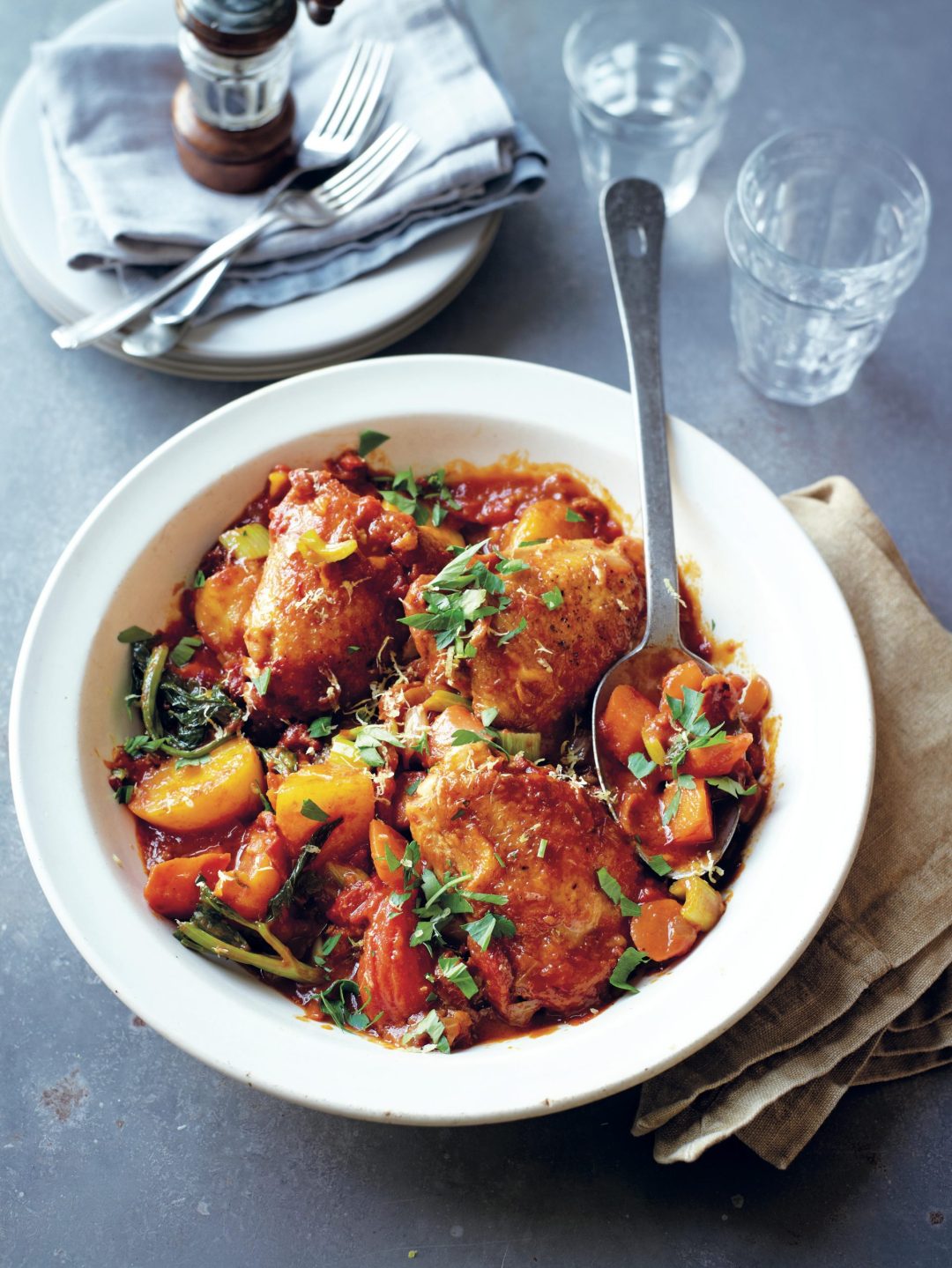 Braised chicken with bacon, saffron, tomato and potato