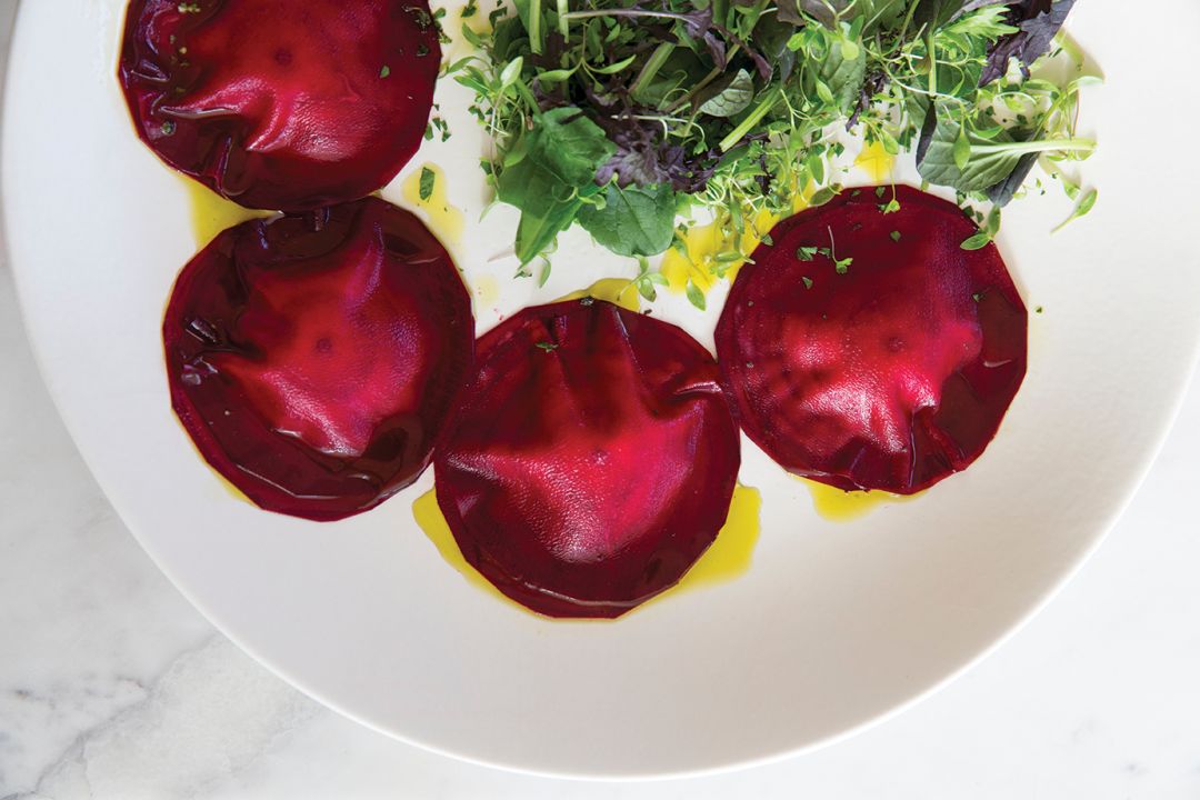 Beetroot, balsamic and macadamia cheese ravioli with basil oil