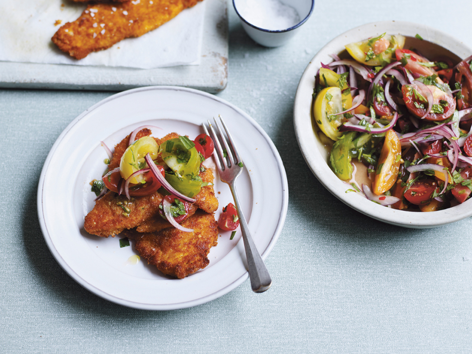 Chicken schnitzel with fresh tomato and chilli salad