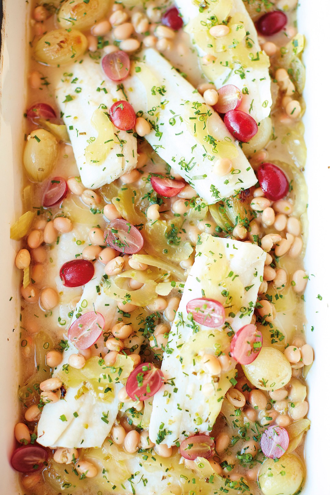 Hot marinated lemon sole with pickled onions and grapes