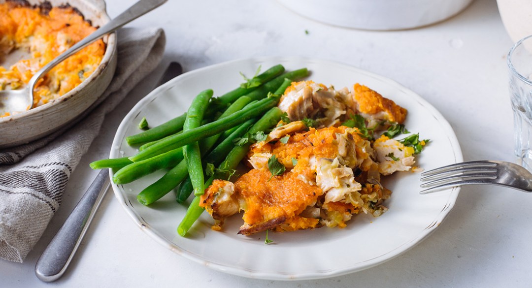 Hot smoked salmon and coconut fish pie with carrot mash