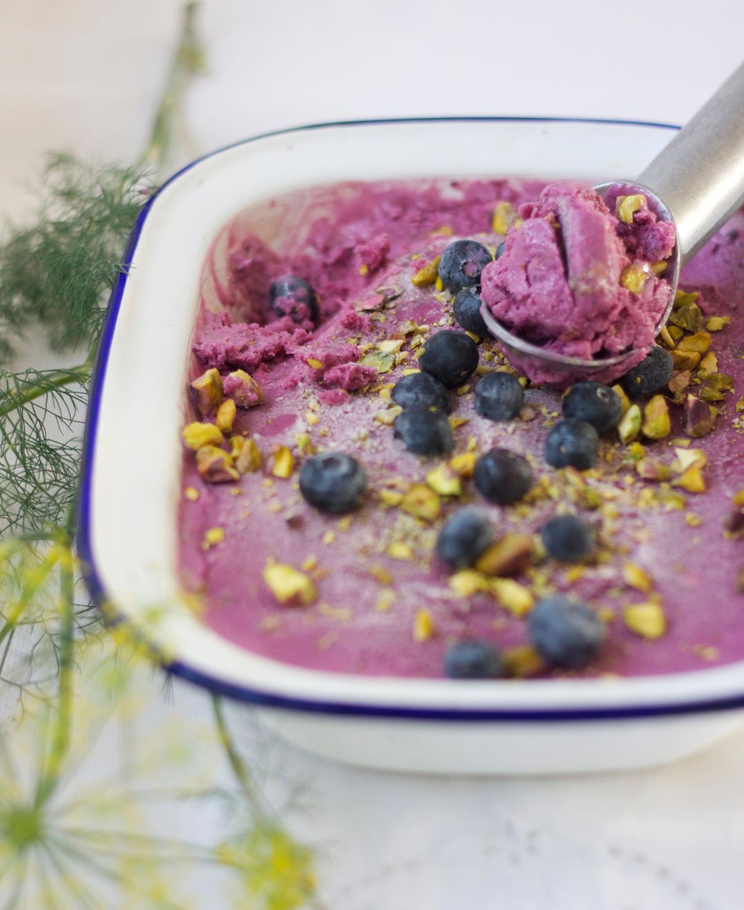 Coconut, blueberry and pistachio frozen yogurt
