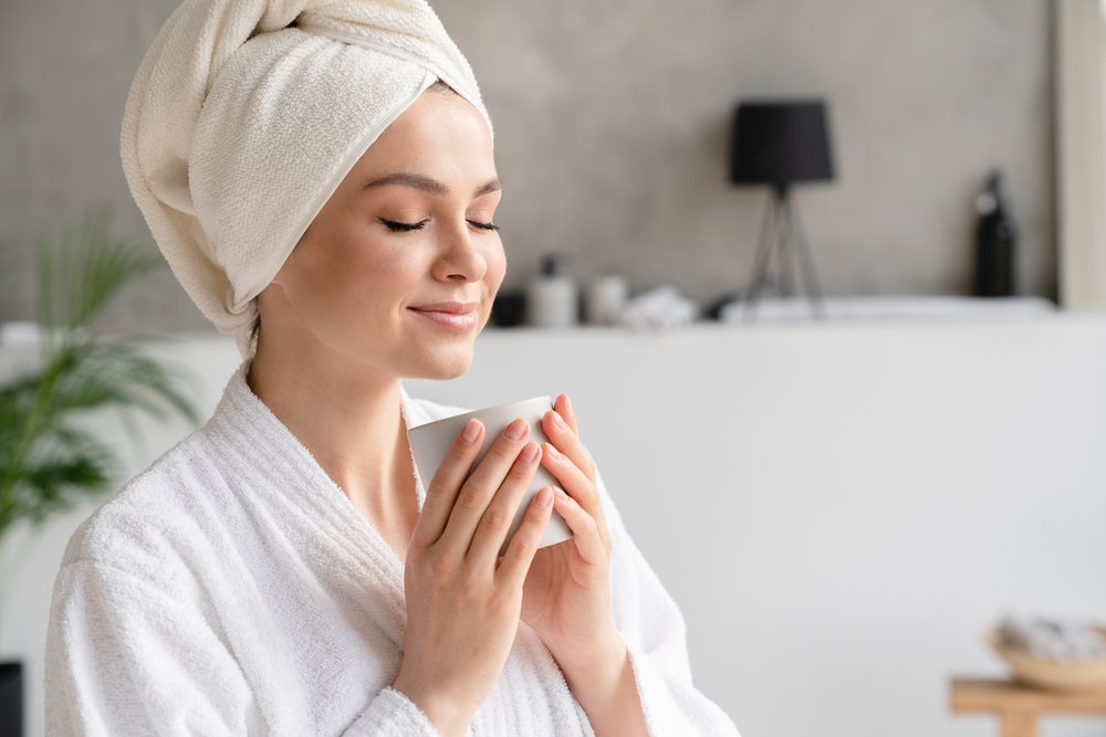 woman drinking tea at-home spa day concept