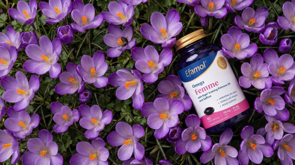 efamol omega femme supplements surrounded by crocus flowers