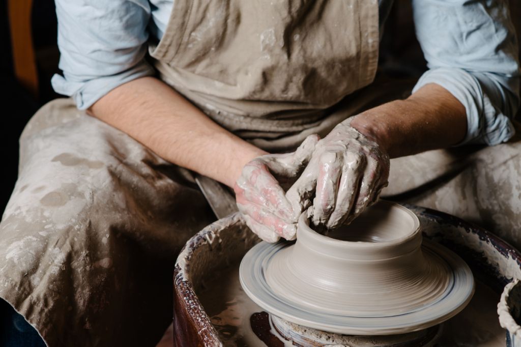 man enjoying pottery, reclaiming joy through creativity