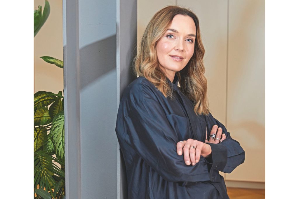 Victoria Pendleton, an attractive 45-year old Oman, smiles at the camera
