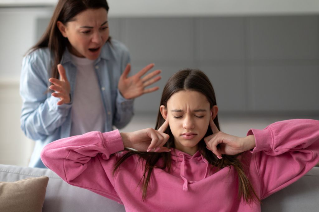 Mum shouts at poor daughter with fingers in ears