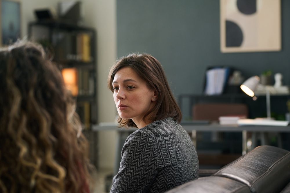 two women talking, she is concerned about her friend