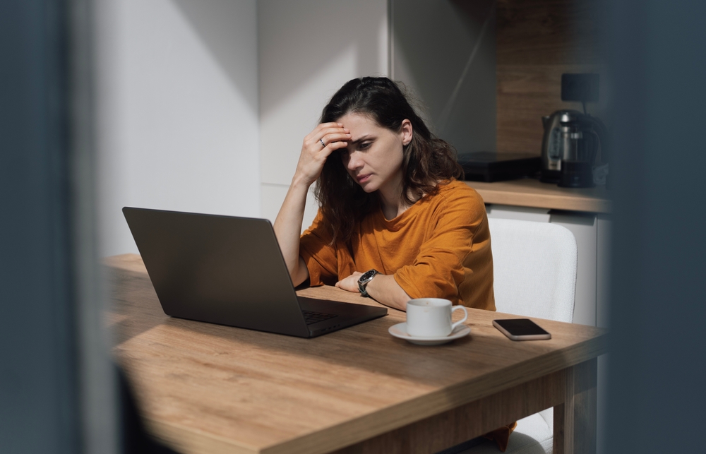 woman feeling lonely while working from home, isolated remote workers