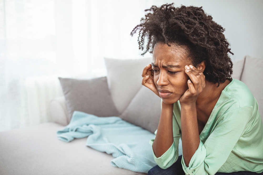 midlife woman looking confused and upset