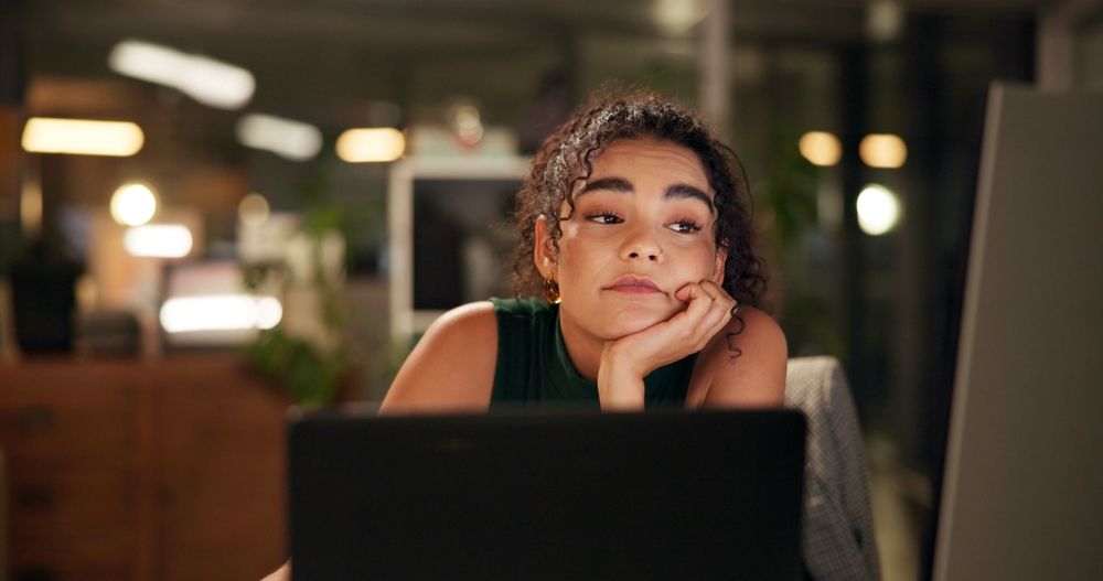woman bored and struggling to focus at work