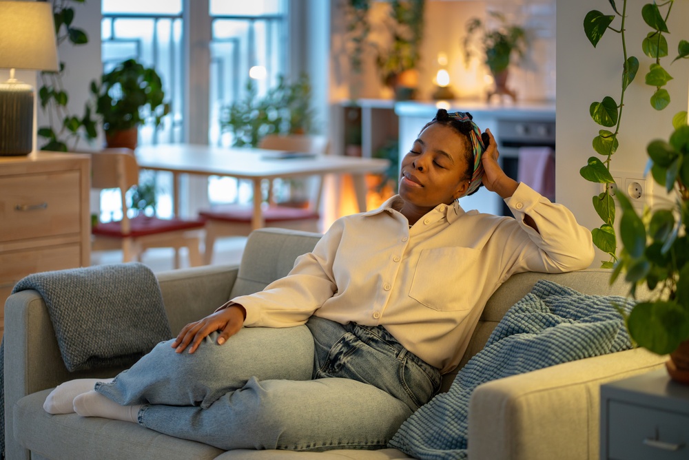 woman resting on the sofa at home