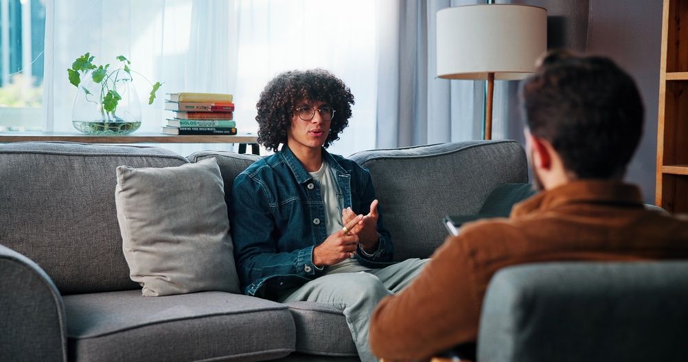 Young man undergoing therapy or assessment