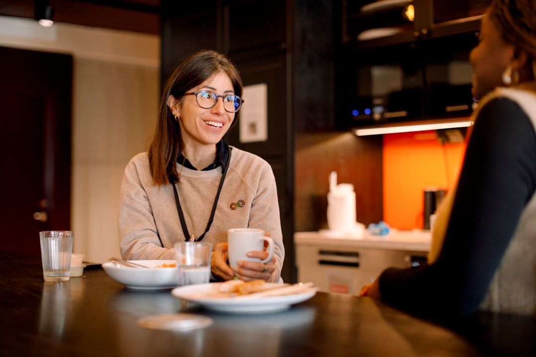Happy businesswomen having coffee